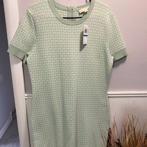 This brand new MK dress is a must have